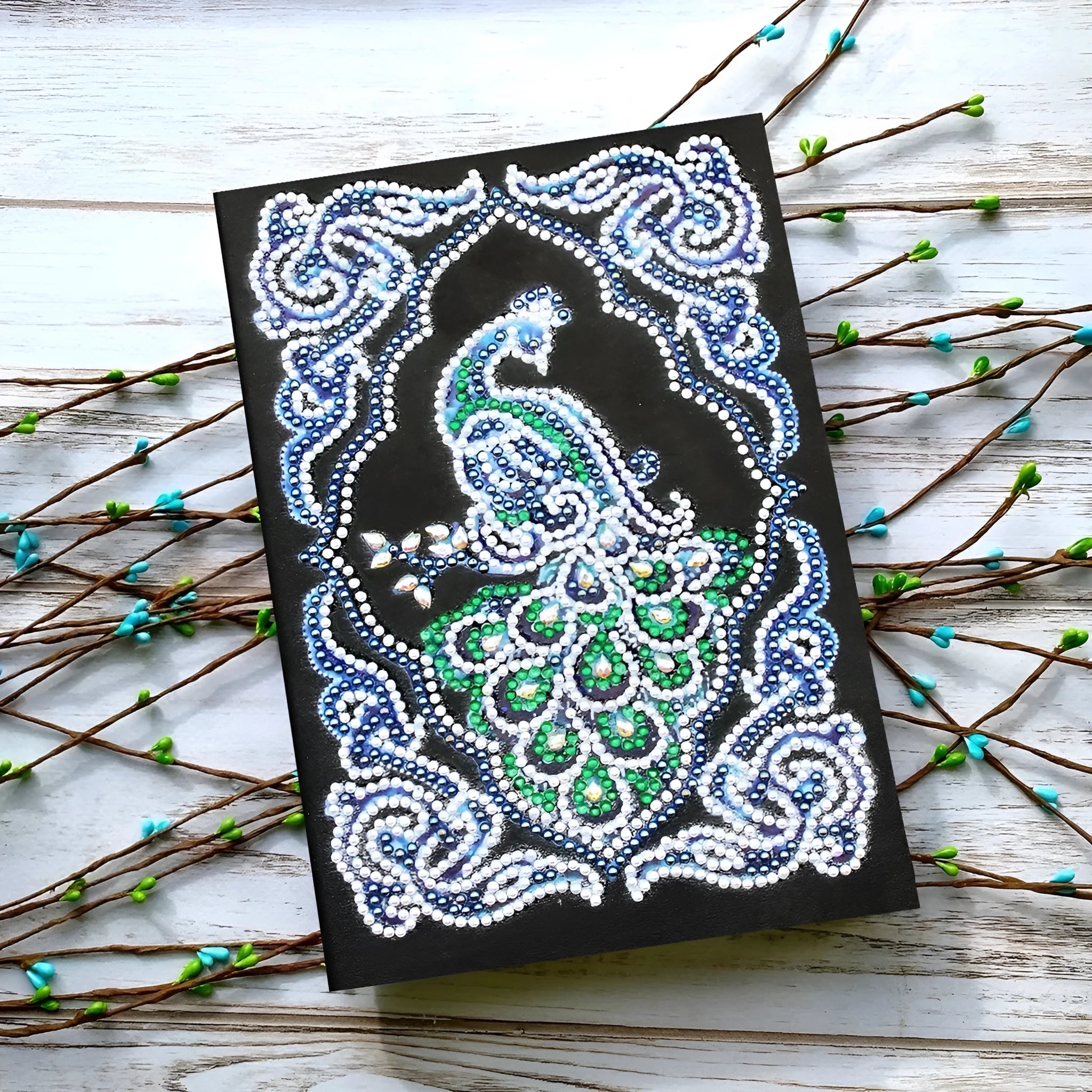 Black A5 diamond painting notebook with peacock design for creative project planning