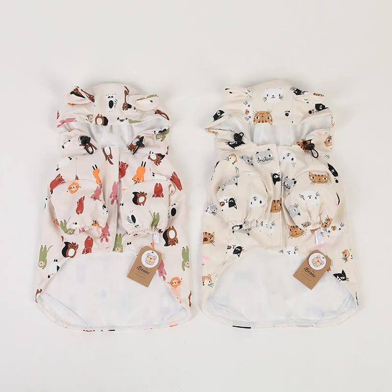 Beige dog raincoat with cartoon print, showing double waterproof PU coating and available in sizes S to XXL.