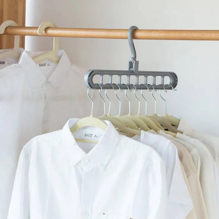 Plastic clothes storage hanger with rotating hook, shown in available colours.