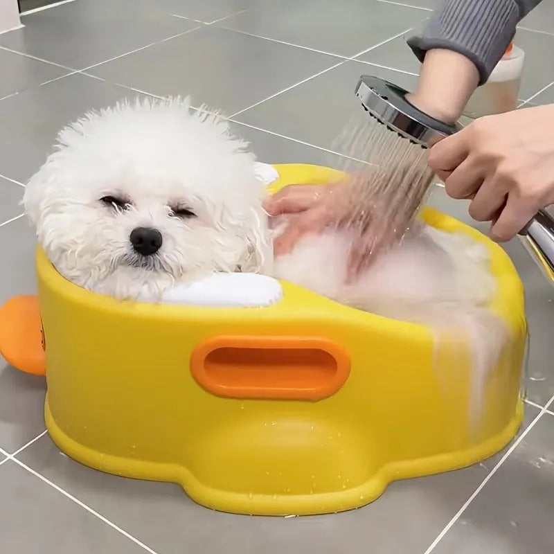 Blue PVC duck-shaped bathtub for dogs and cats on a white background