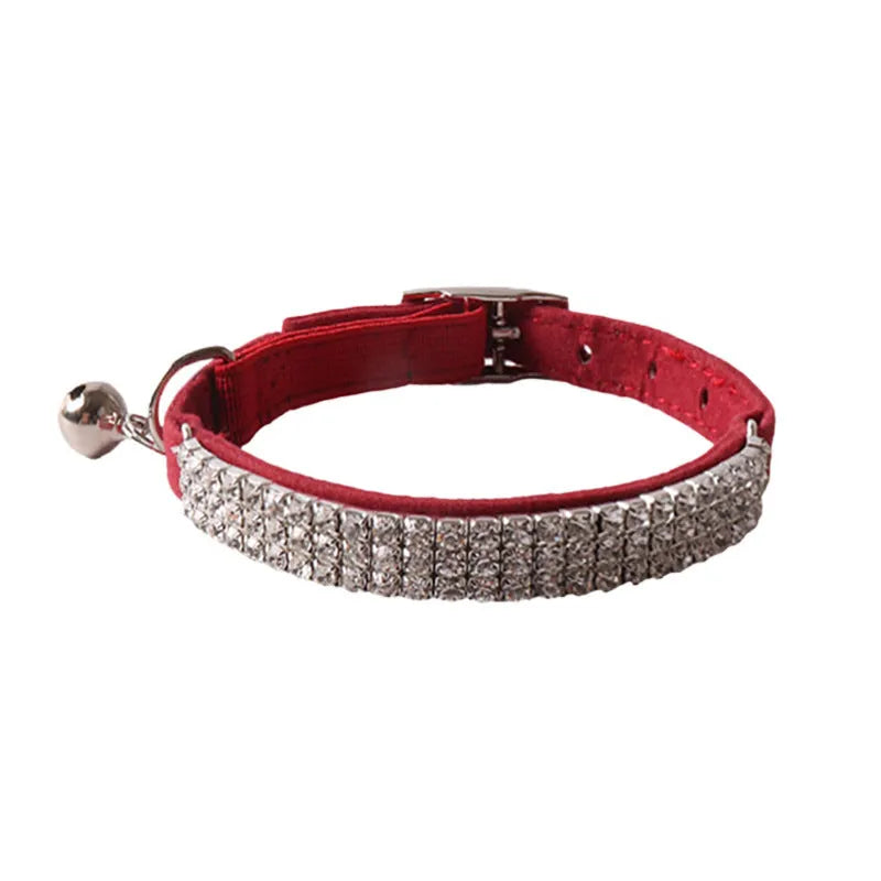 Soft flocking cat collar with an elastic buckle, shown in pink, black, red, blue, purple, and dark brown.