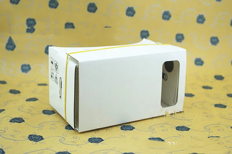 VR cardboard glasses kit with pink frame, 3D lenses, rubber band strap, and magnet for 6-inch phones.
