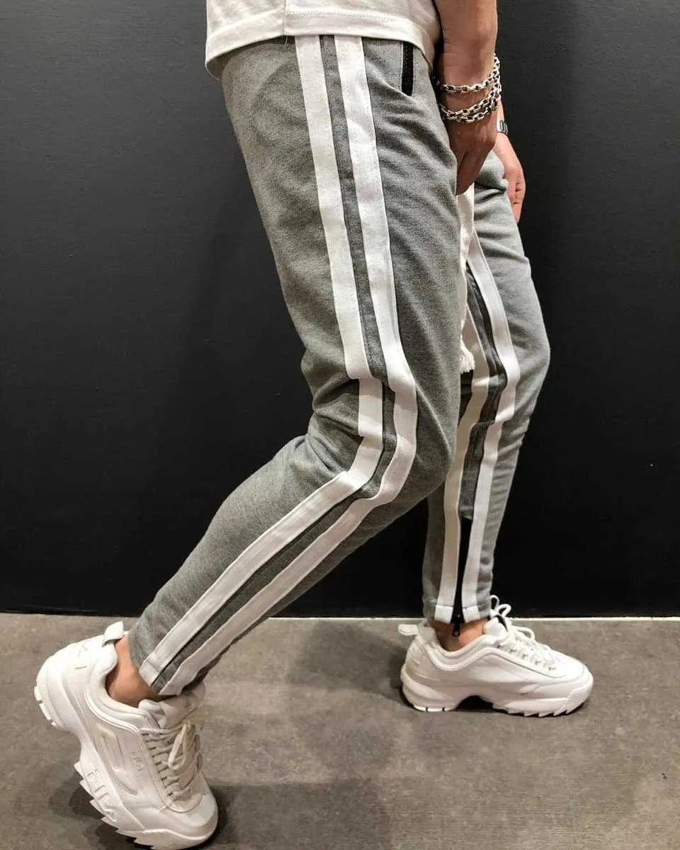 Men's cotton blended micro-elastic zipper casual trousers in black, tapered leg style