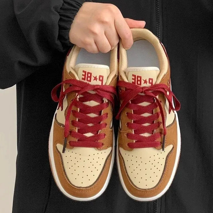 Brown women's low-top platform sneakers with round toe and sequin trim details