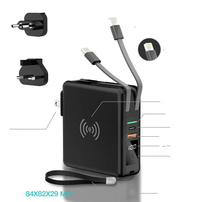 Black and white 10000mAh power bank with QI wireless charging and a set of international plug adapters