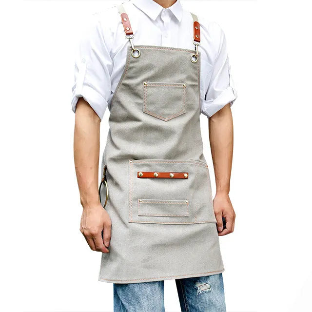 Canvas apron with cross back straps in camel colour