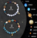 Set of two natural stone beaded bracelets with zodiac sign designs and a stainless steel clasp.