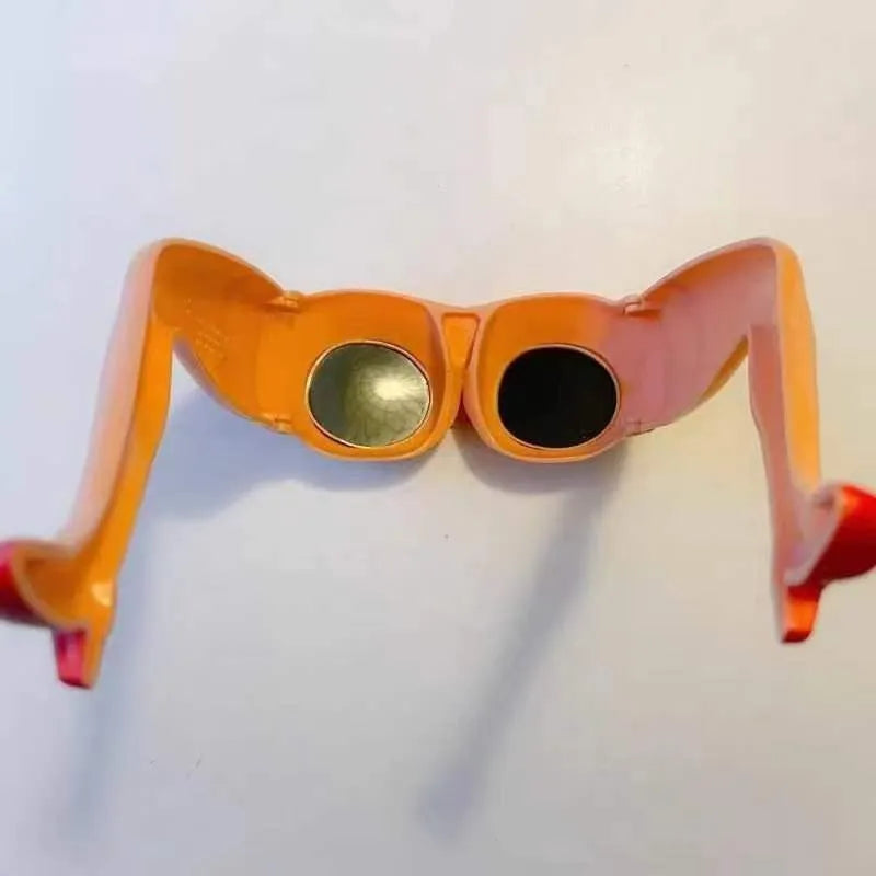 Orange Novel Personality Leg Hip Sunglasses, a plastic fashion accessory for sun protection and parties.