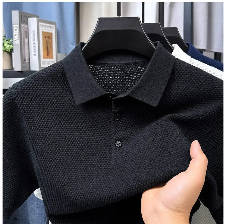 Loose fit pure cotton short sleeve pullover sweater shown in various colours including grey and navy.
