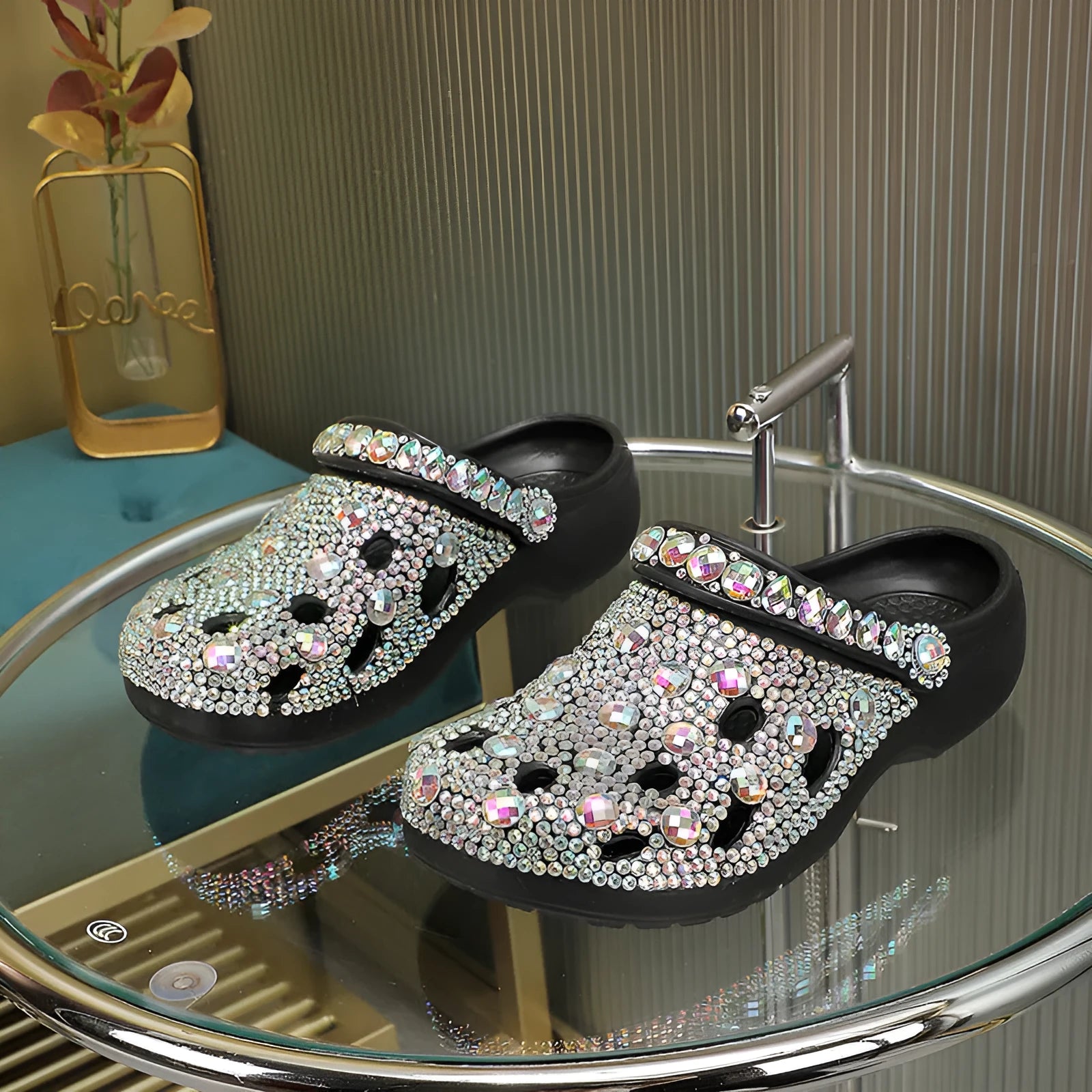 Black women's platform sandals with rhinestone details and hole design on EVA material