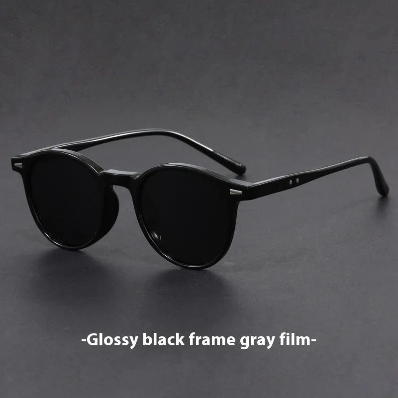 Round retro oval sunglasses with polarised lenses in Sand Black, Bright Black, Green, Gray, and Dry Tea frame colours.