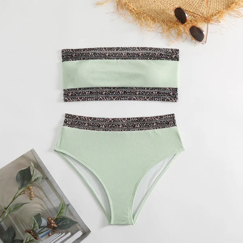 Black strapless split swimsuit with leopard print splicing detail.