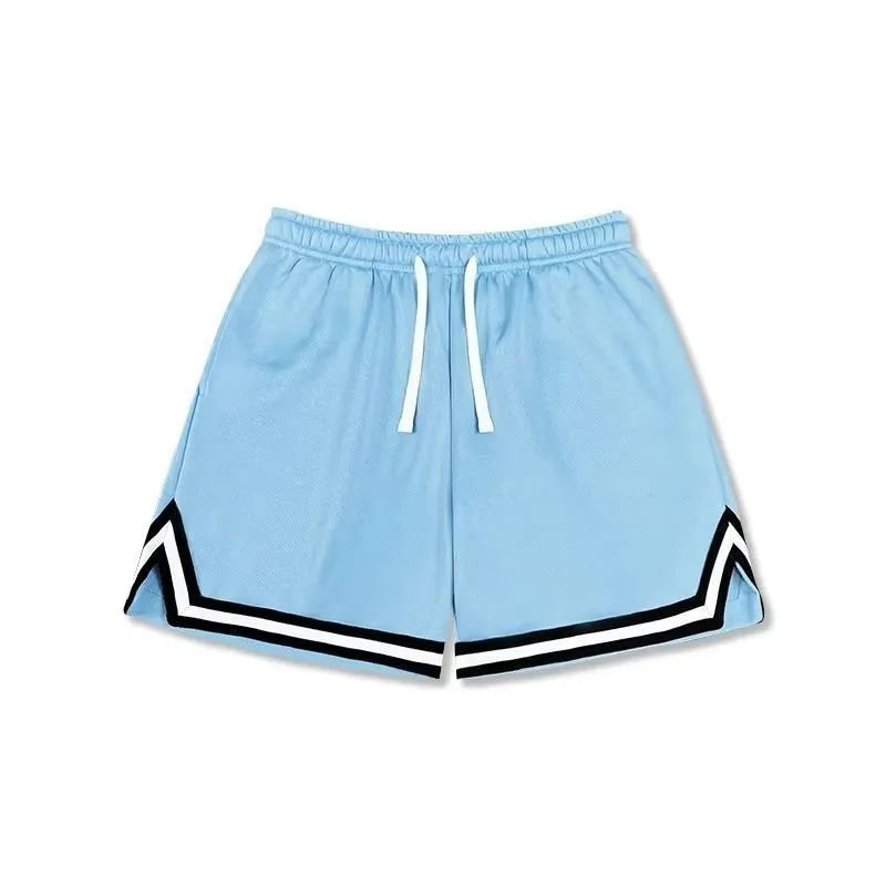Man wearing loose fit grey polyester sports shorts on a summer day.