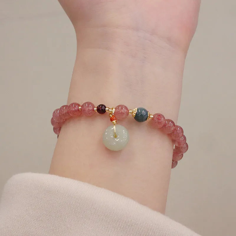 Pink strawberry quartz purse bracelet with geometric shapes and safety buckle closure