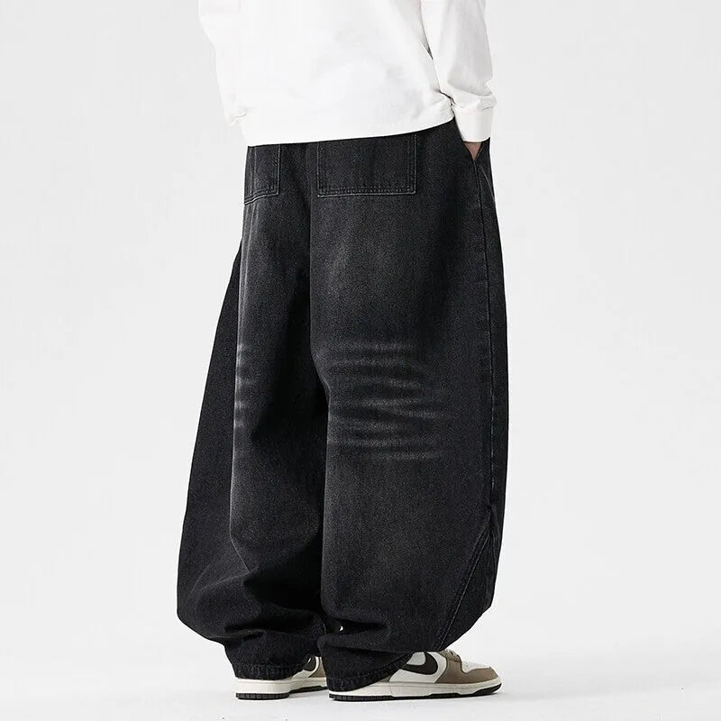 Men's plus size wide leg casual jeans in dark blue denim with straight leg opening