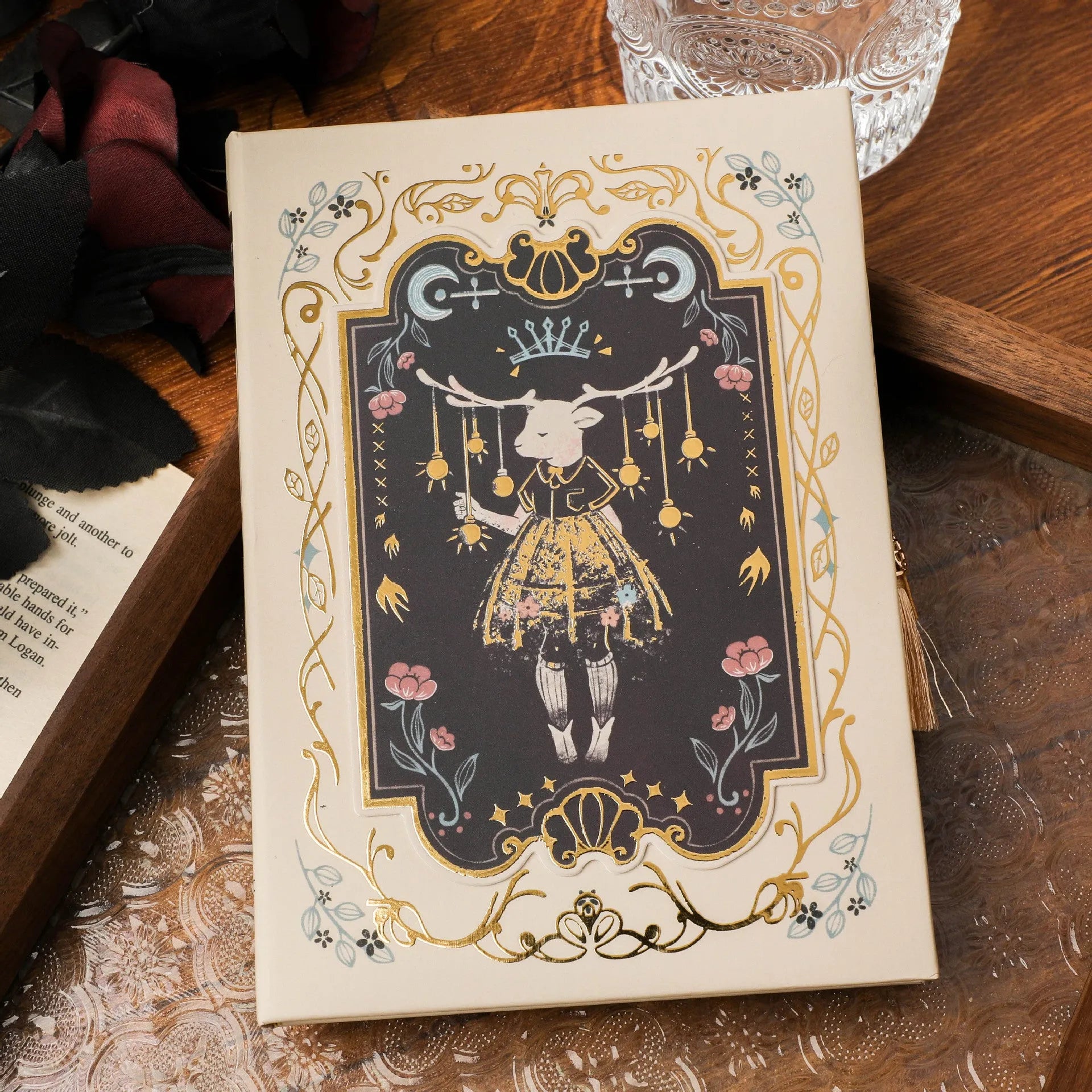 THALO A5 gothic retro art notebook showing three cover design options on wooden surface