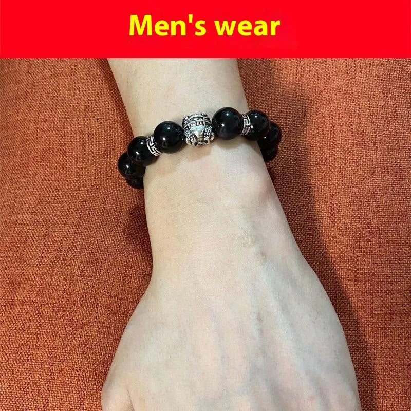 Obsidian bead bracelet with natural cloud patterns and a 999 silver clasp.