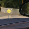Yellow and black cartoon bee car decoration made from fur ball material measuring 3x3cm