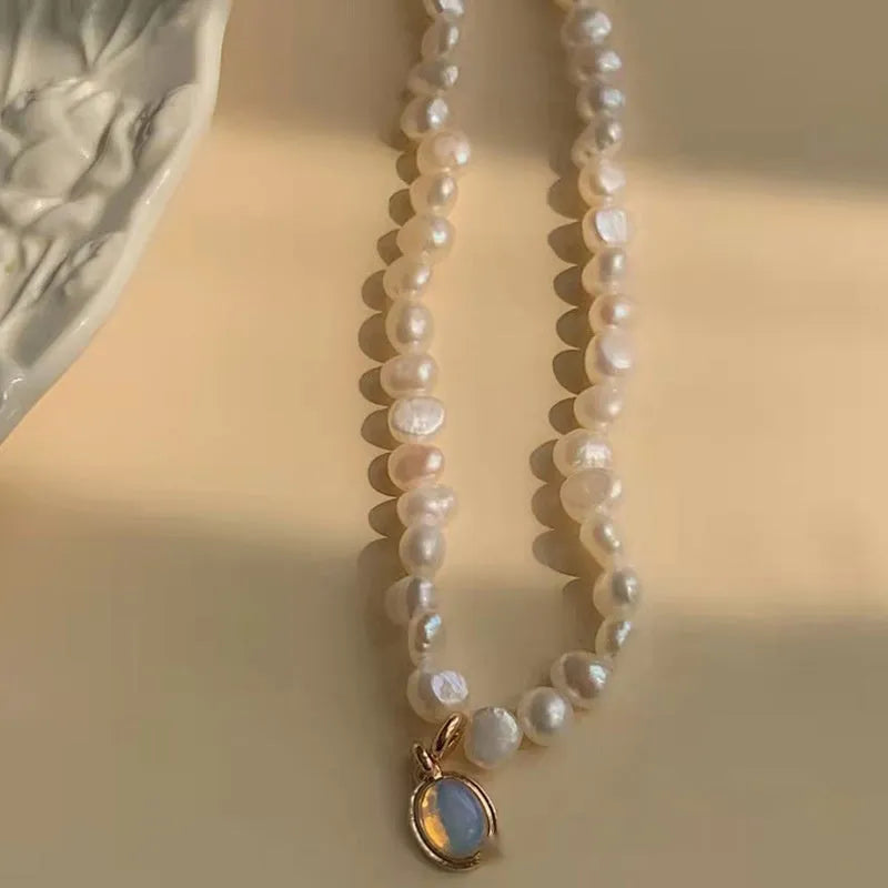 Vintage pearl necklace with geometric pendant on adjustable chain