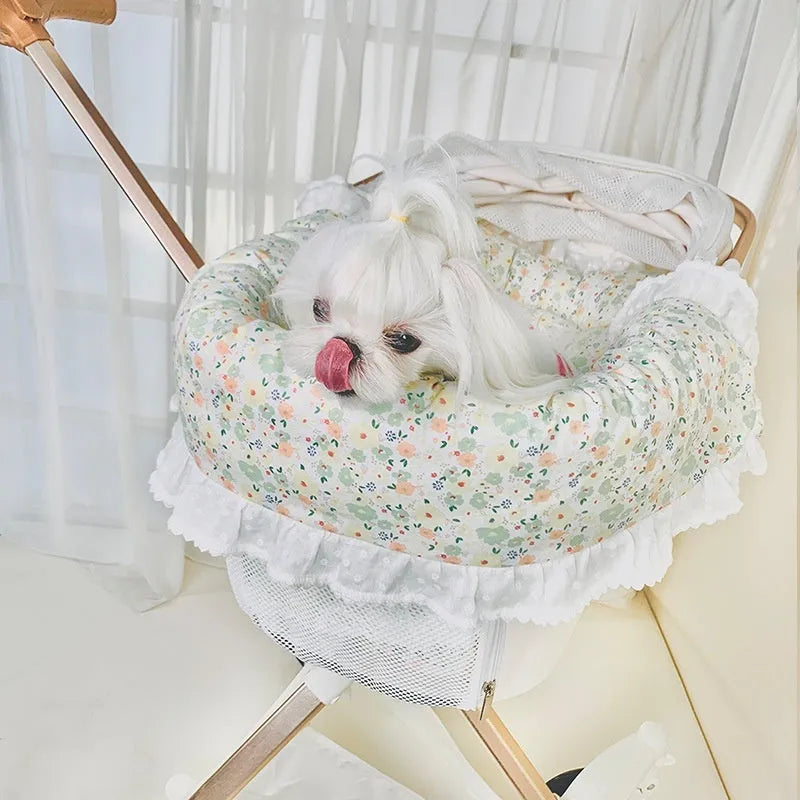 Pet stroller three-piece set showing removable towel, cushion and pillow in floral pattern
