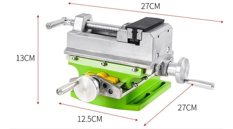 Mini bench drill and milling machine on a workbench with cross bench pliers and heavy-duty pliers.