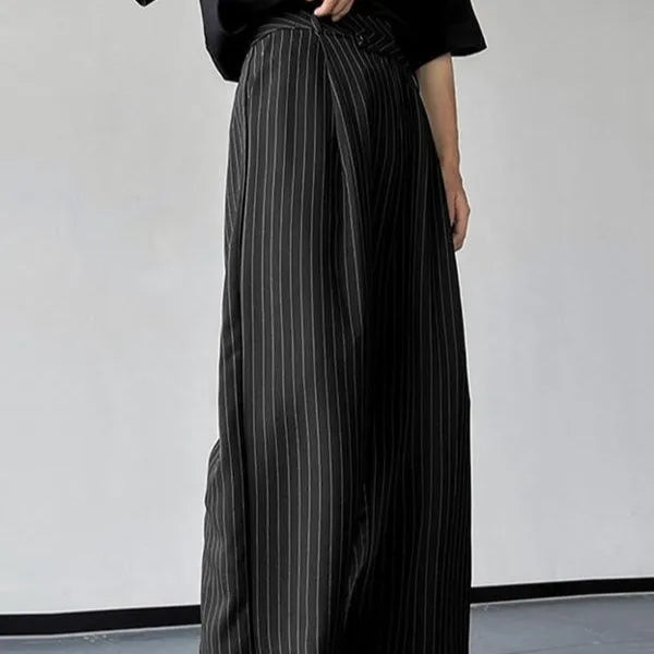 Black men's trousers with vertical stripes, front pleats, and a soft rabbit hair bamboo fibre fabric blend.
