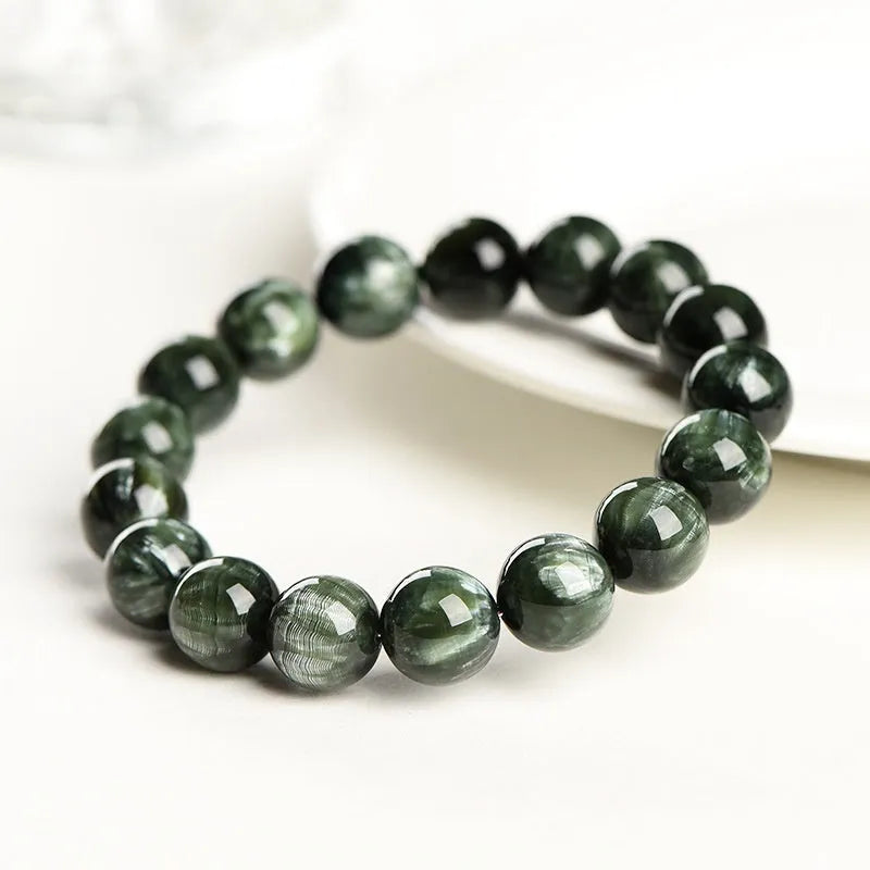 Natural green dragon crystal bead bracelet with geometric 8-9mm beads and Ruyi decoration.