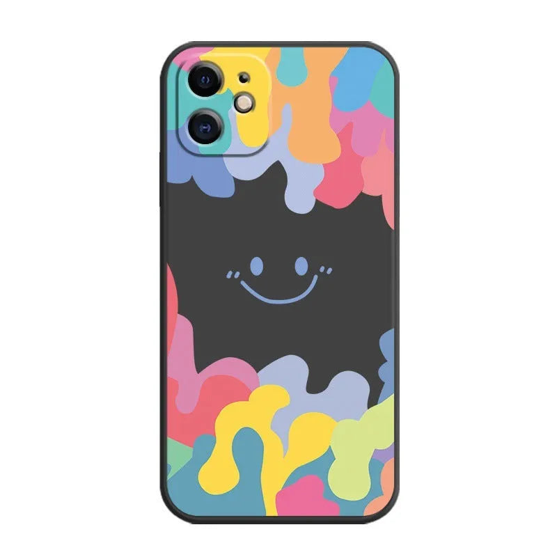 White silicone iPhone case with rainbow smiley face design and attached lanyard