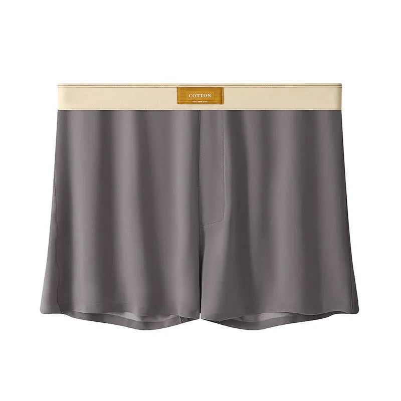 Men's solid colour loose ice silk underwear in a pack of three, shown in beige, black, and grey.