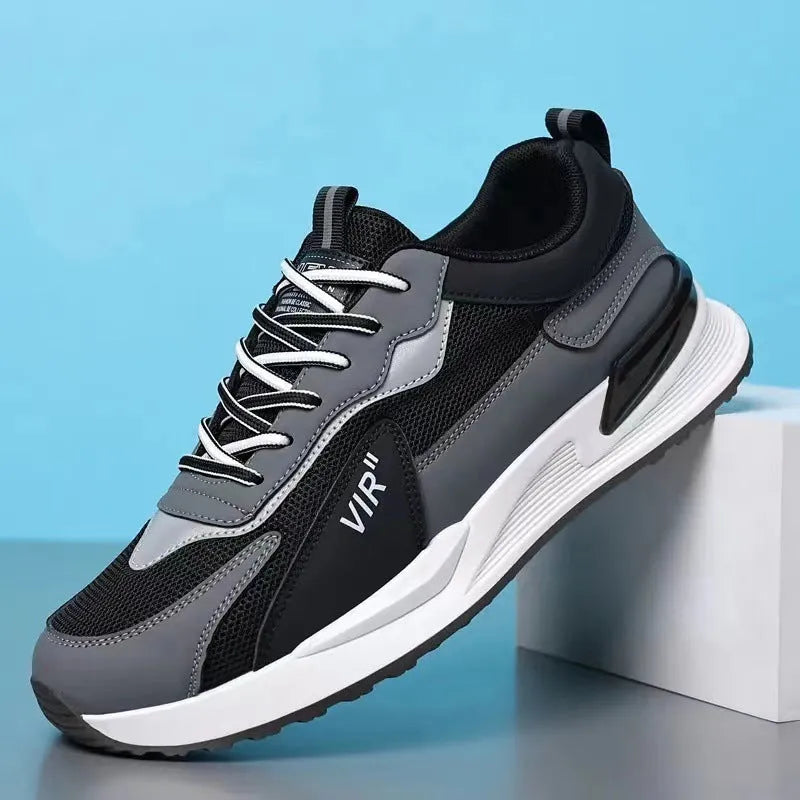 Men's colour block mesh sneakers in black, grey, or white on a plain background