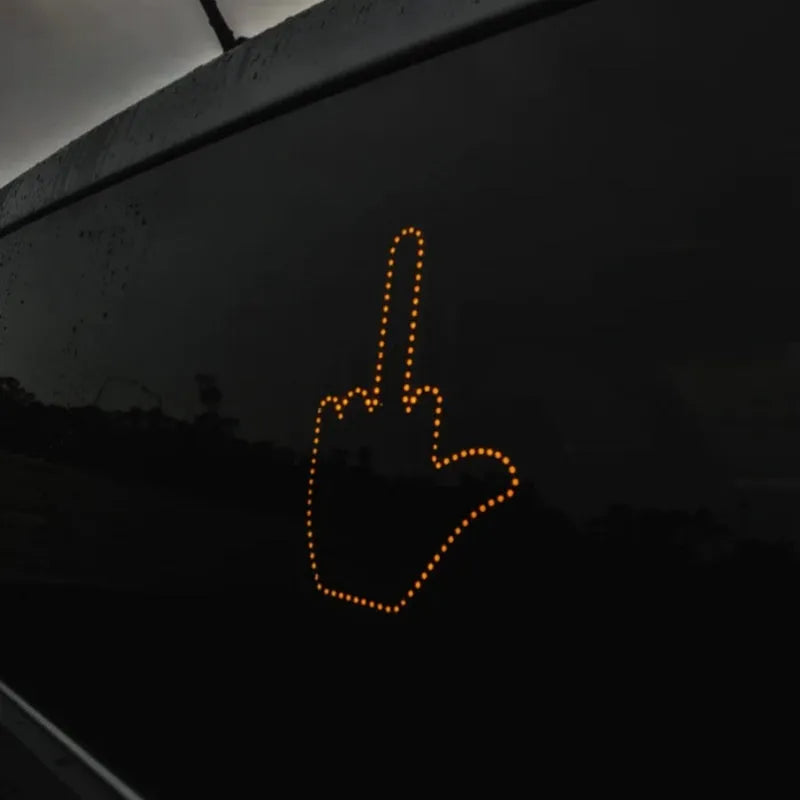 Black plastic car gesture light with LED illuminated hand gestures and remote control