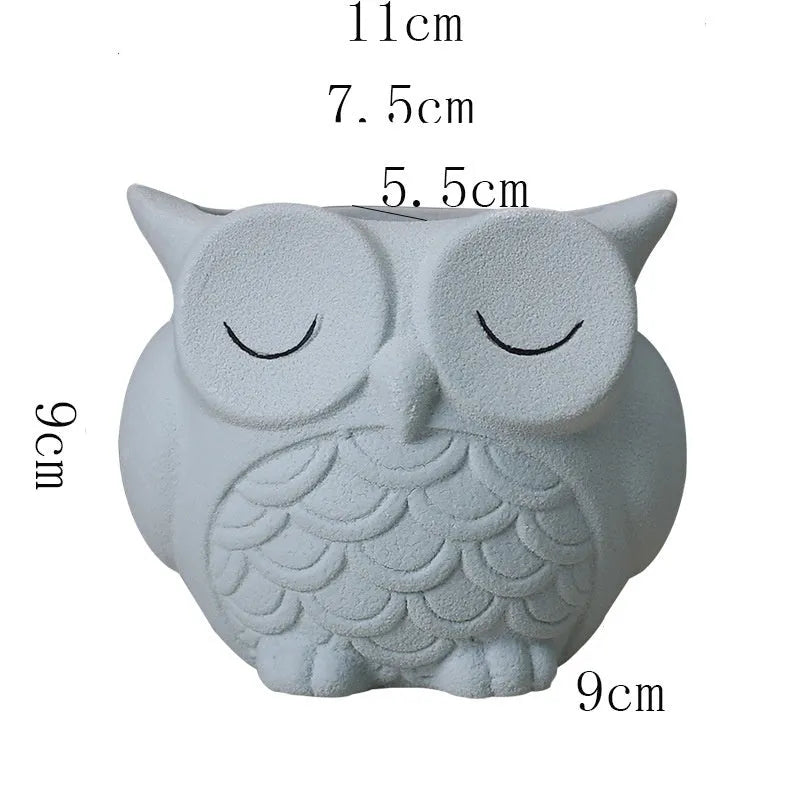 Handmade frosted ceramic flower pot with a cartoon owl design for small succulents.