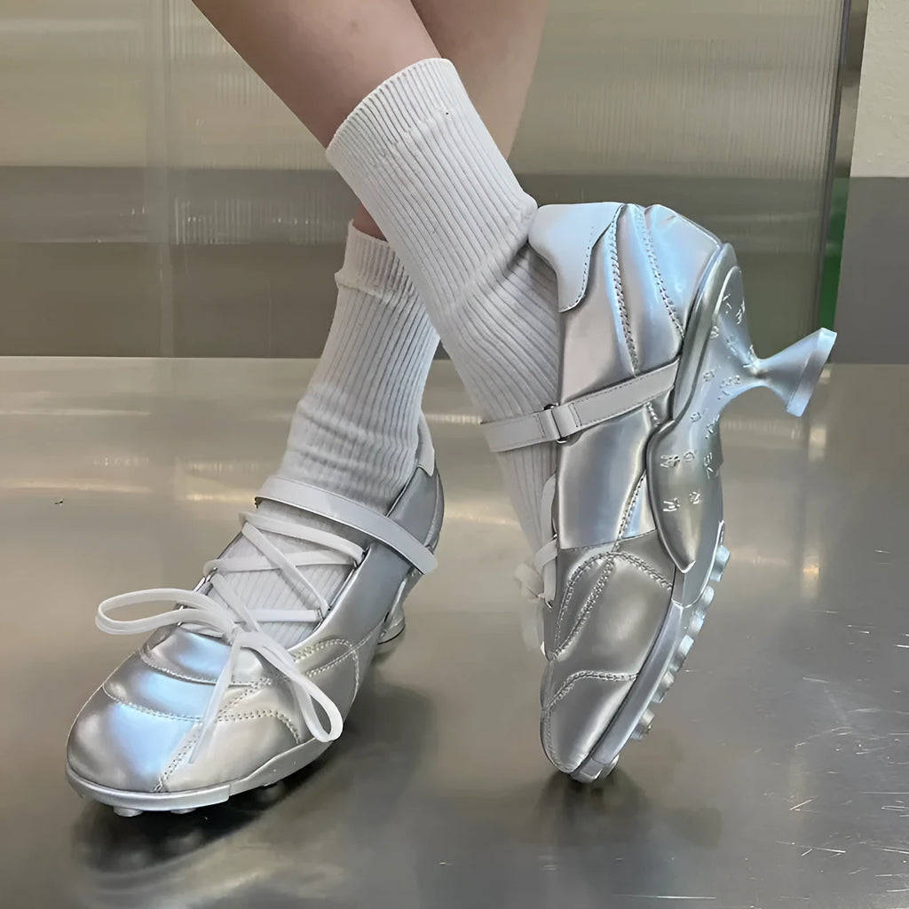 Women's silver lace-up bow sports shoes with mid heel and round toe on white background
