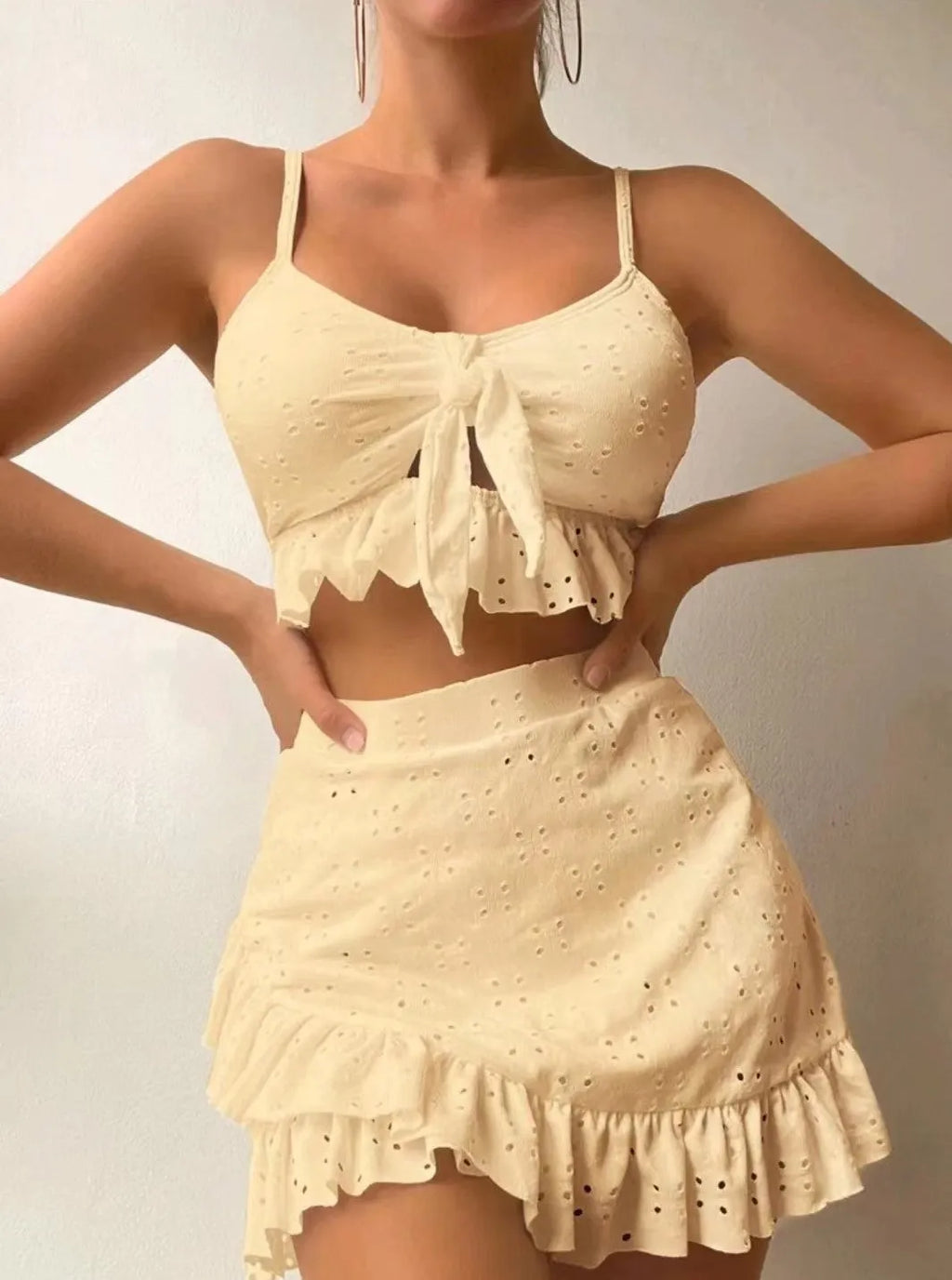Women's three-piece bikini swimsuit with split hip skirt in solid colours