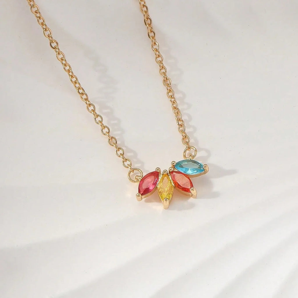 Rhinestone leaf necklace copper geometric pendant gold colour on display