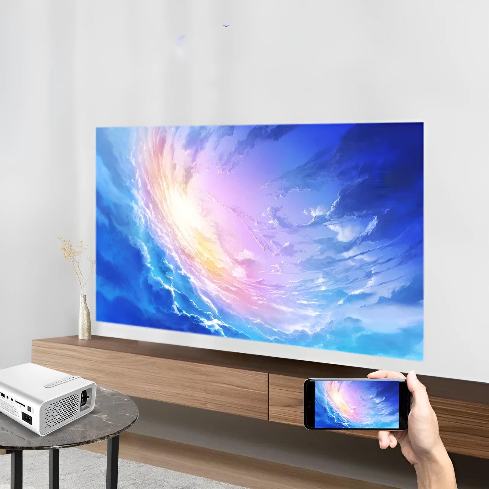 YG530 portable LED projector in black colour showing wireless connection to mobile phone