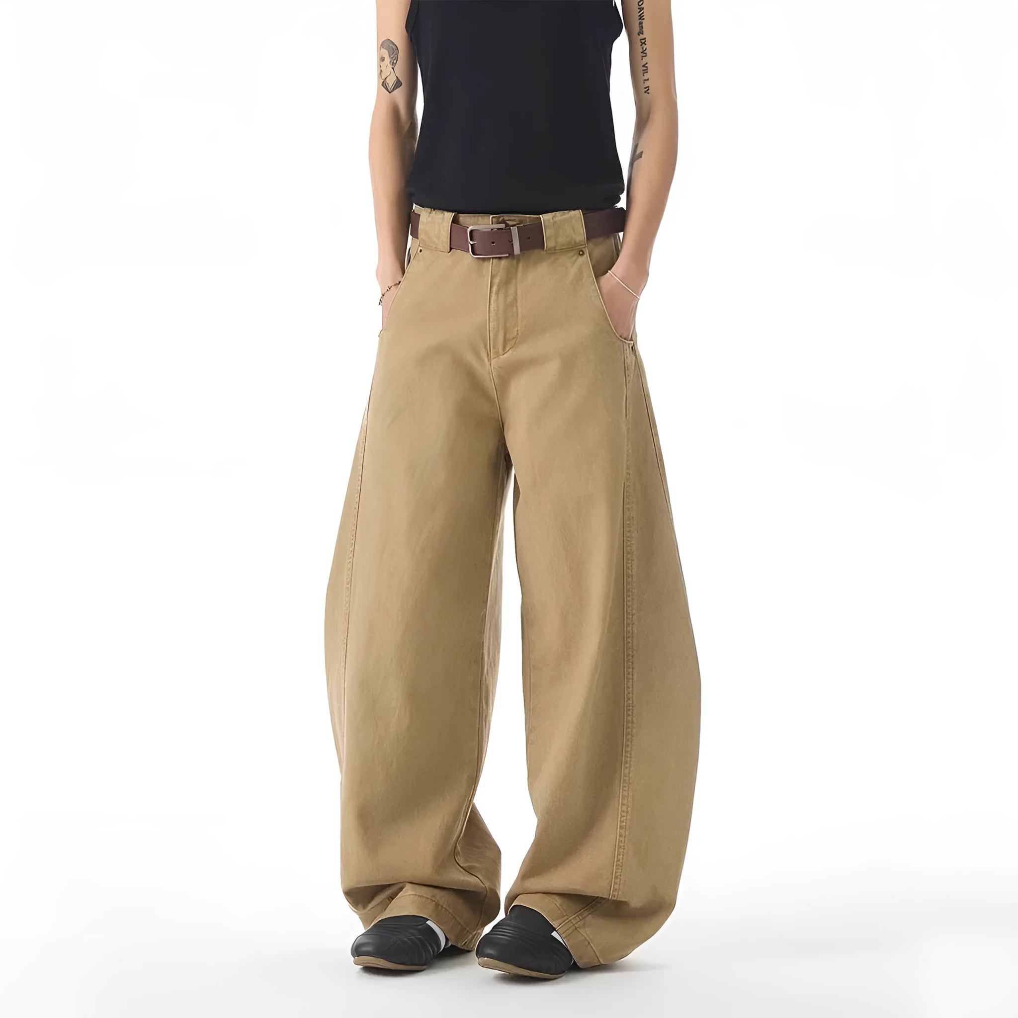 Brown men's loose fit straight leg denim jeans with a mid waist and button fly, shown laid flat.