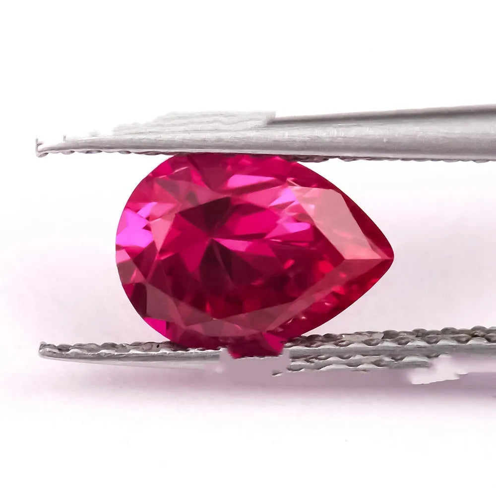 Lab-created ruby gemstone in egg, round, princess, water drop, grandmother, and Asche cuts.