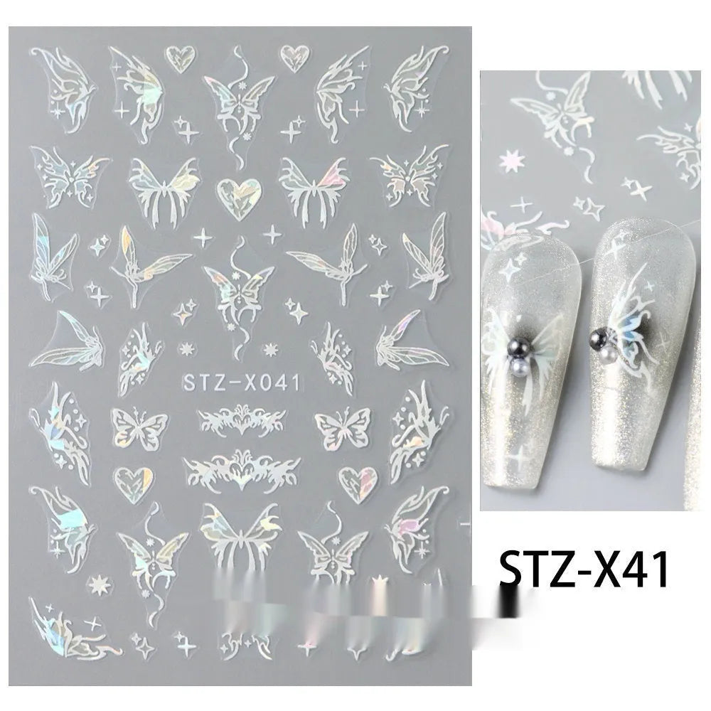 Pack of black and silver strip nail art stickers with cartoon and love pattern designs.