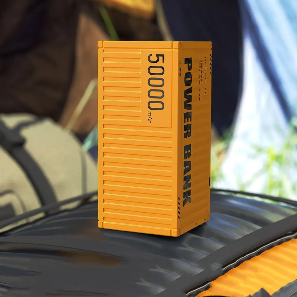 Yellow 50000mAh portable power bank with digital display screen and five USB output ports