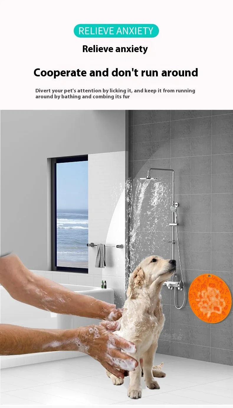 Round grey silicone pet lick mat with textured surface and a clear suction cup on its base.