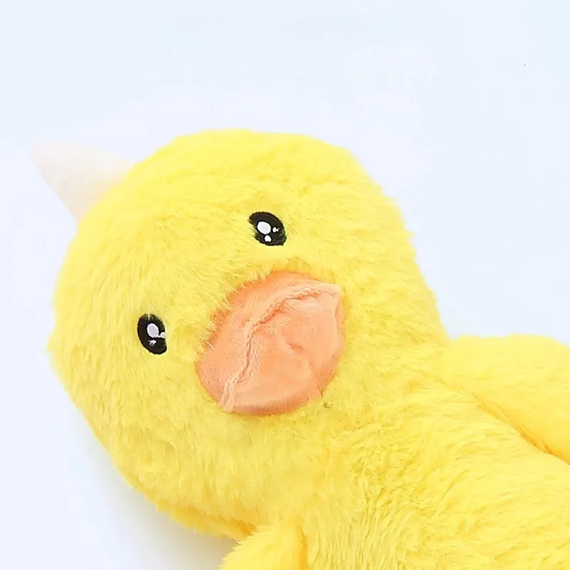 Large pink and yellow plush dog toy with squeaker and crinkle sounds for golden retrievers