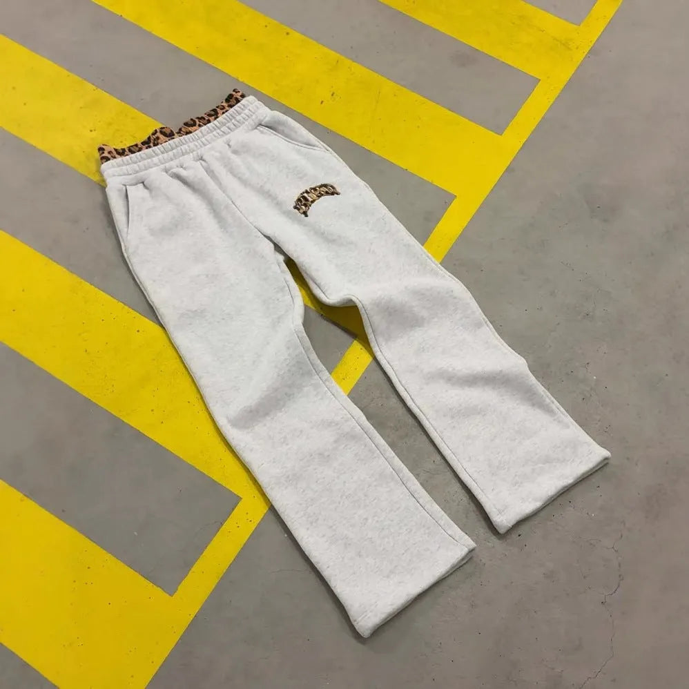 Men's loose patchwork waist hip hop trousers in elastic polyester fabric for sports wear