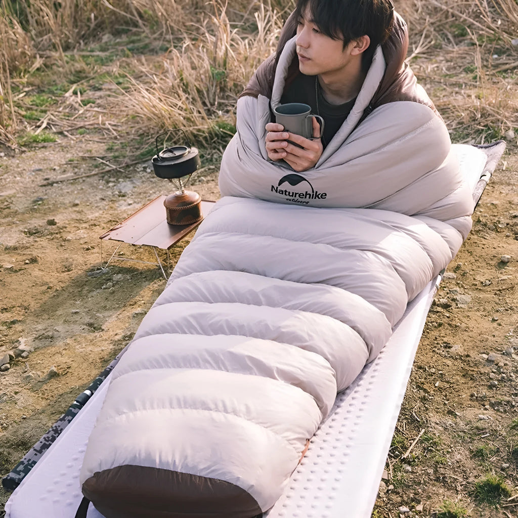Mummy style goose down sleeping bag with storage bag in various colour options