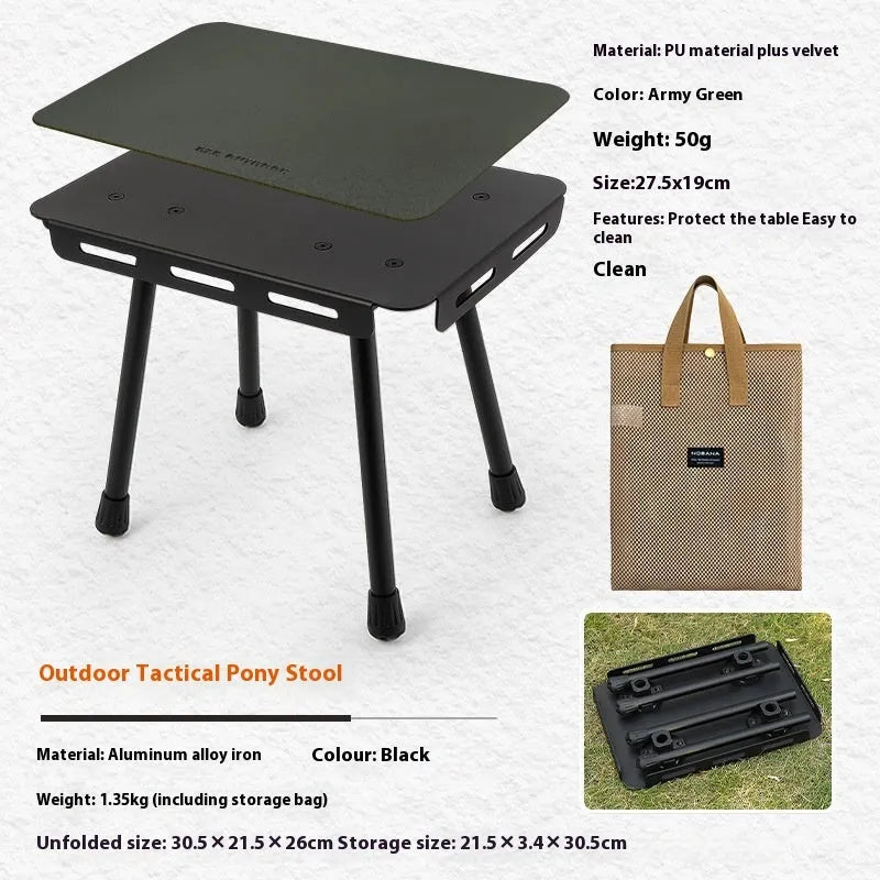 CLS aluminium alloy dual-use folding camping table shown converted into a stool with a green PU mat cushion.