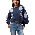 Sapphire blue women's loose pullover with woven floral jacquard pattern on chenille fabric.