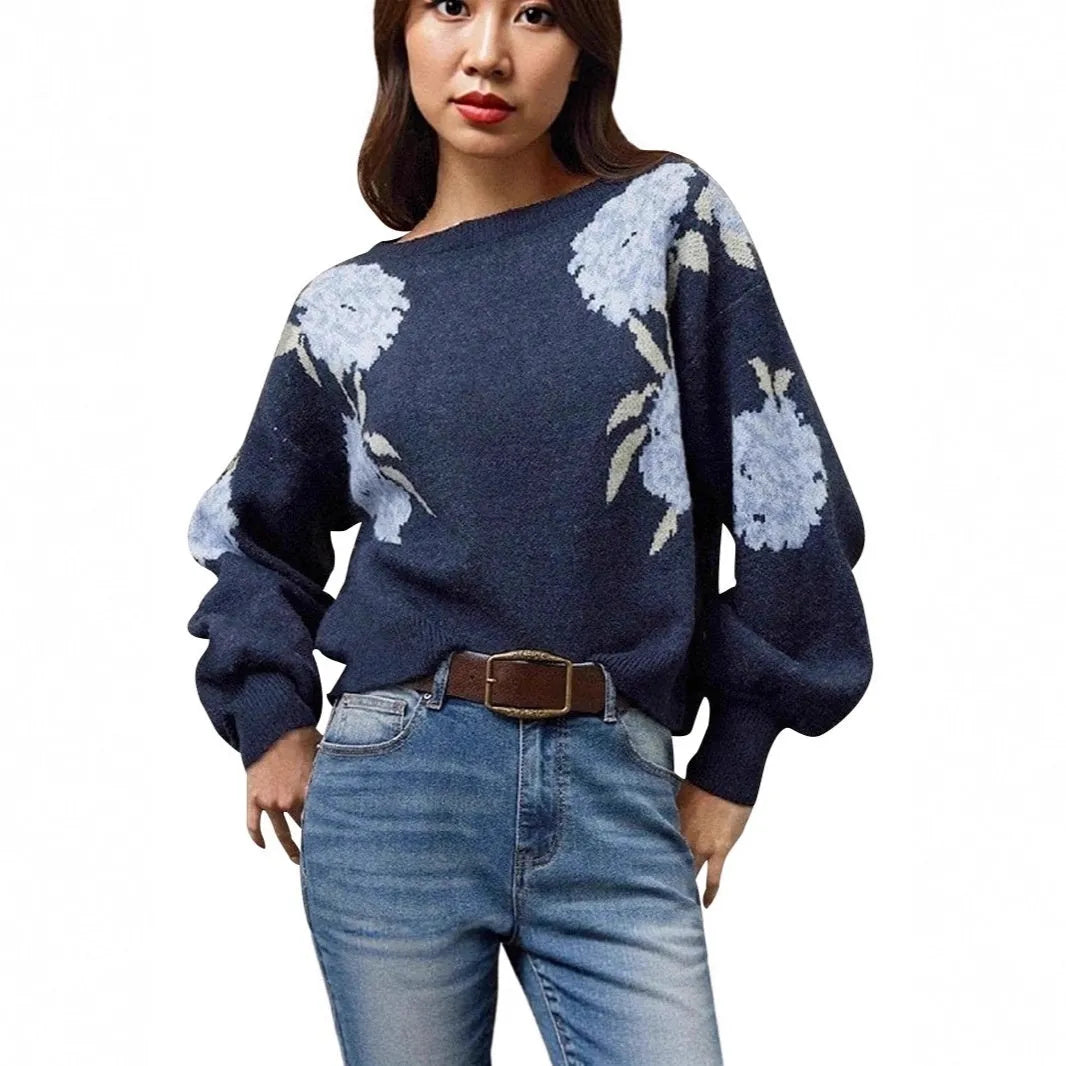 Sapphire blue women's loose pullover with woven floral jacquard pattern on chenille fabric.