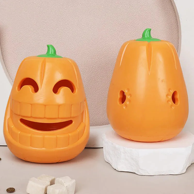 Orange pumpkin shaped interactive dog chew toy with treat dispensing funnel