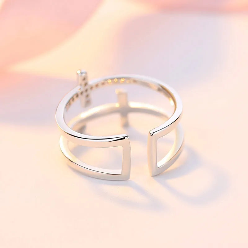 Adjustable double cross zircon ring with copper construction and white gold electroplated finish