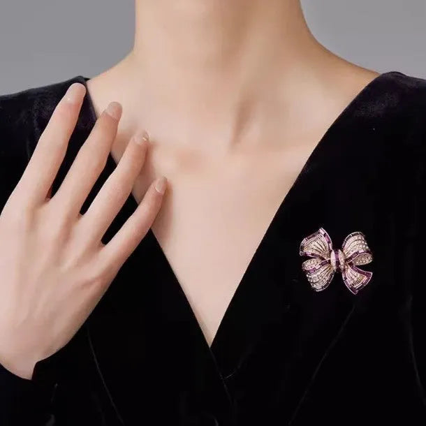 Alloy bow brooch in purplish red, blue, and purple colours for women